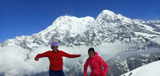 Mardi Himal Trek, Clients enjoying views and with snow on the top of View point Hike from High Camp