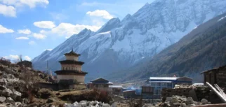 Himalayas churten and teahouse in Kenchenjung Trek